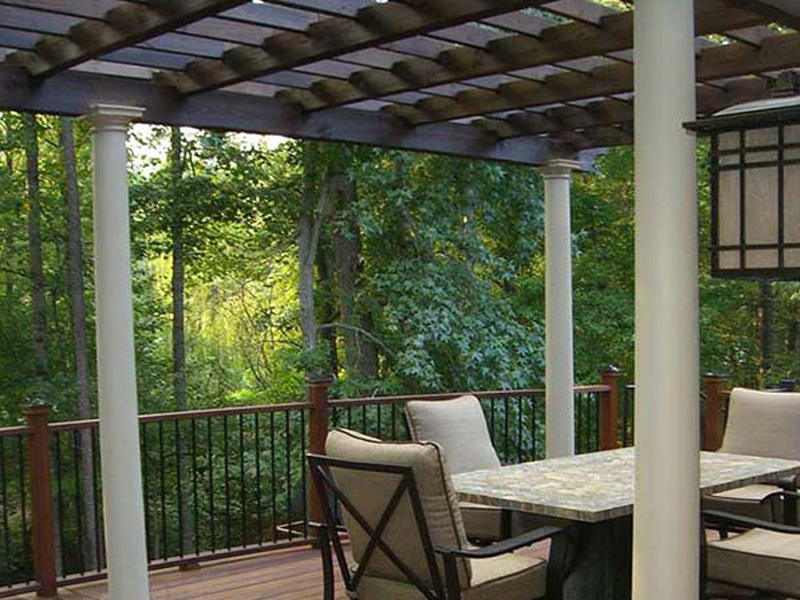 Pergola-covered deck with forest view in North Atlanta