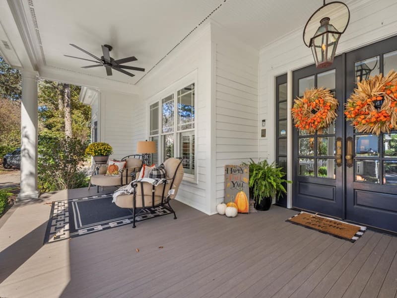 A beautiful porch was designed by Exterior Design + Decks in Woodstock, GA.