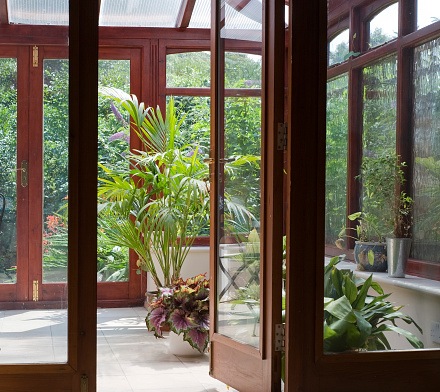 Featuring wooden doors & windows showcasing an outdoor space from our project in North Atlanta