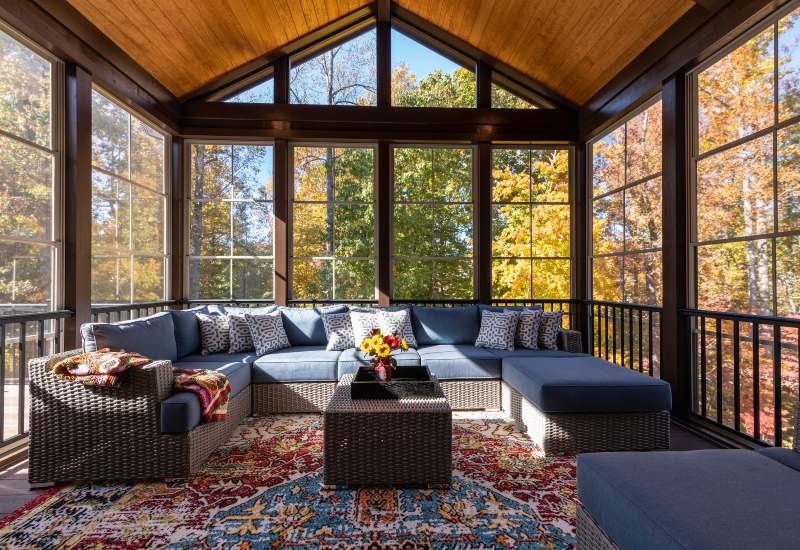 Beautiful sunroom built by Exterior Design + Decks in North Atlanta with comfy seating