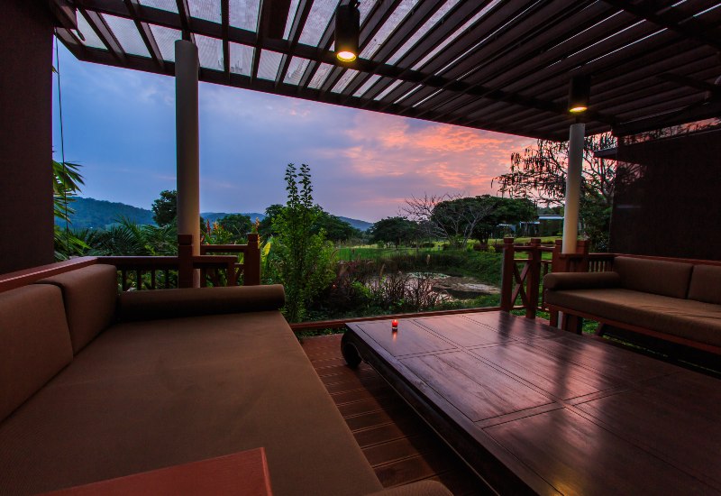 Custom deck along with cozy seating area constructed by Exterior Design + Decks in North Atlanta