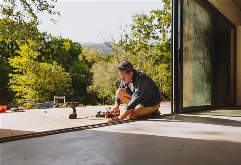 A Team member from Exterior Design + Decks is building a beautiful patio in North Atlanta